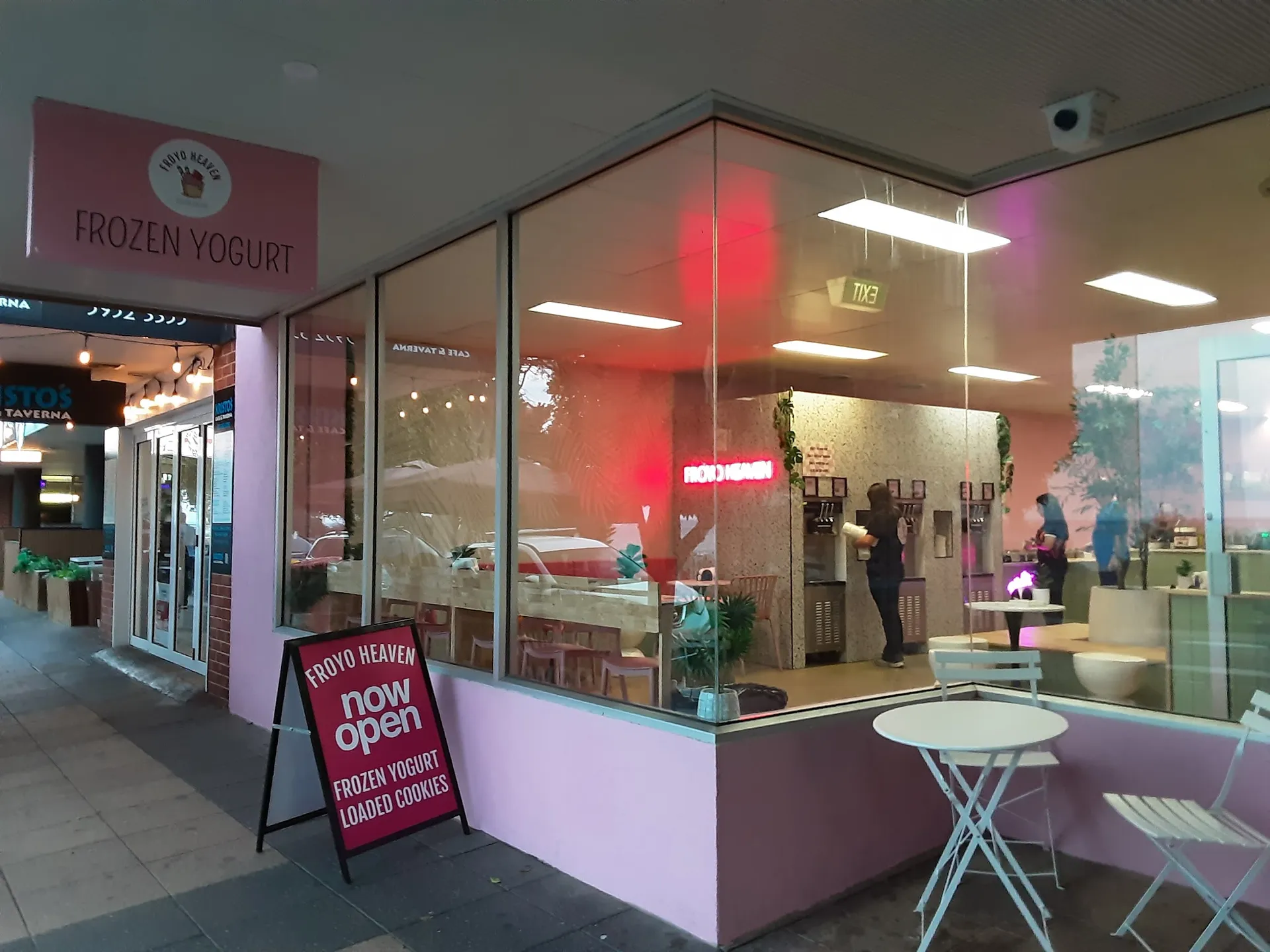 Froyo Heaven Leongatha storefront at evening with pink signage and lit interior