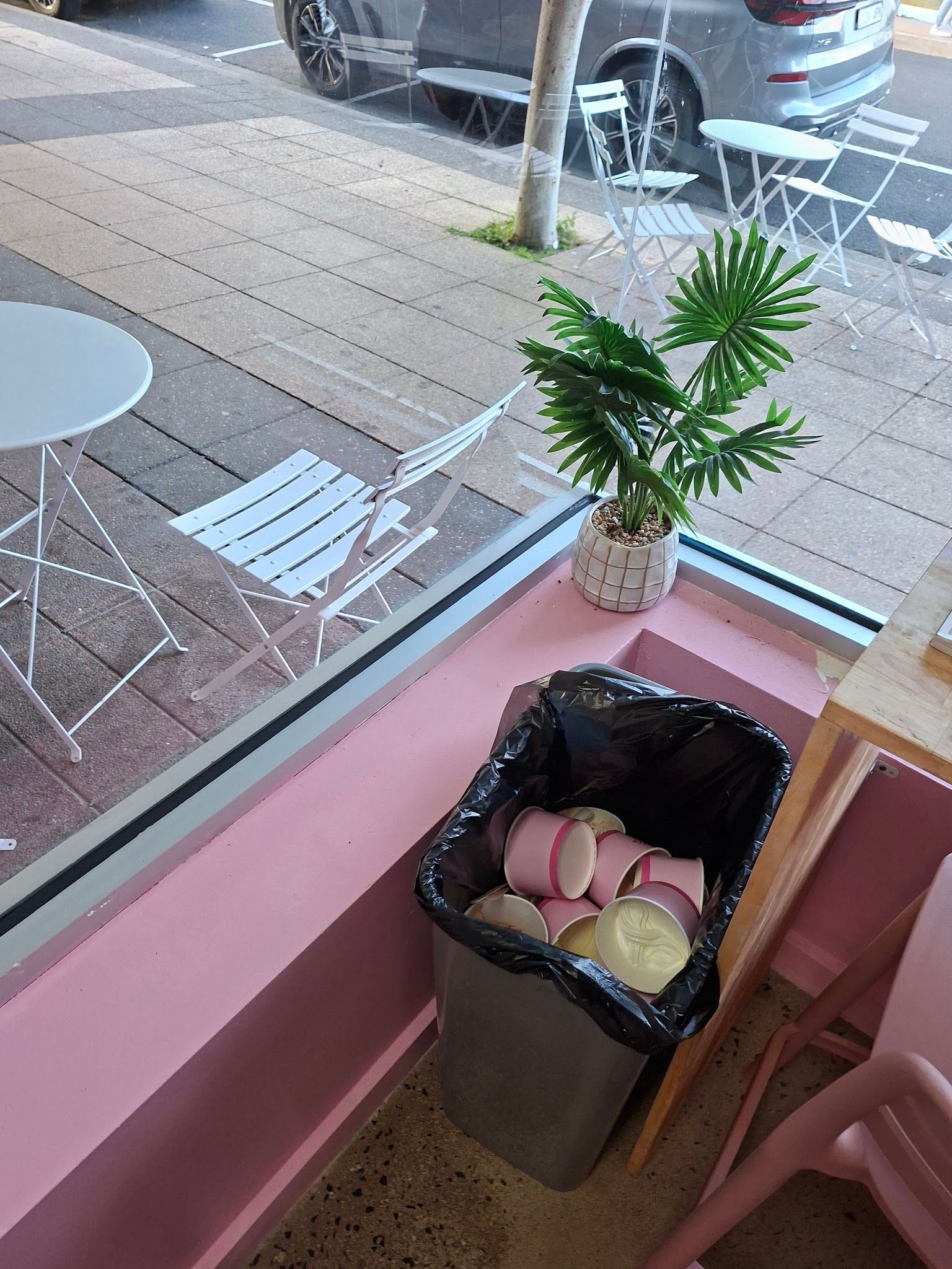 Window bar seating inside Froyo Heaven Cowes overlooking the Esplanade with bay views